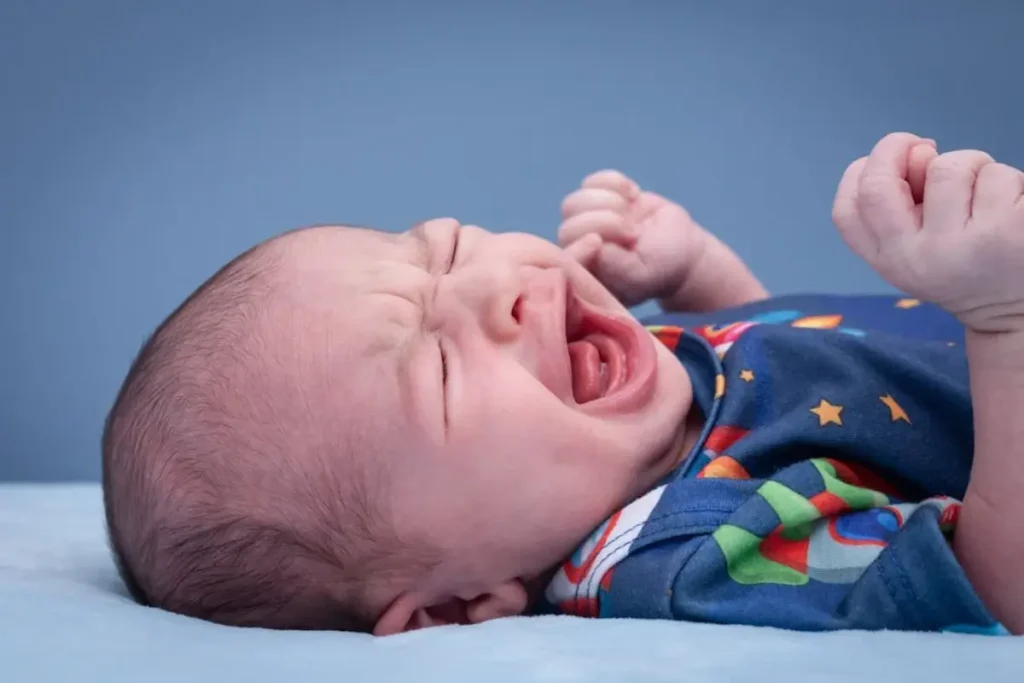 Baby Rolls Onto Stomach While Sleeping But Can't Roll Back (3 Main Reasons)